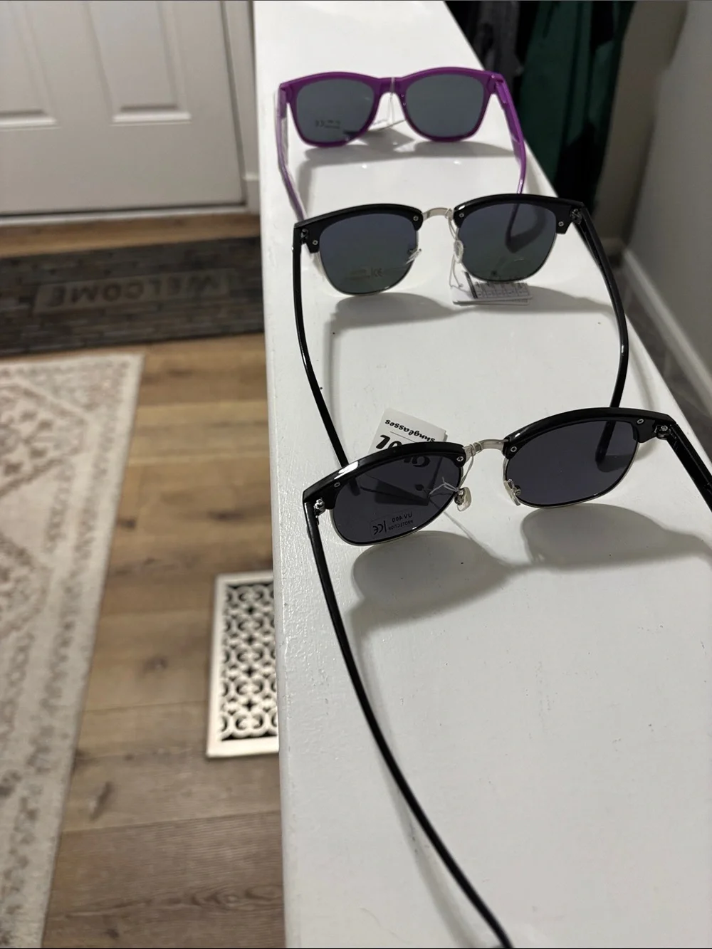 3 pair owl sunglasses with tags.
